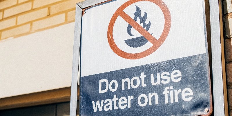 A large warning sign with the symbol for "Do Not Use Water on Fire"