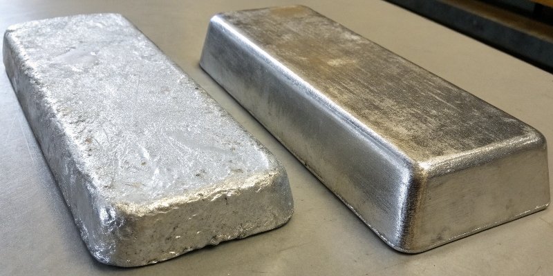 Primary vs. Secondary Aluminum Quality A side-by-side comparison of a clean, uniform primary aluminum ingot and a rougher, discolored secondary aluminum ingot