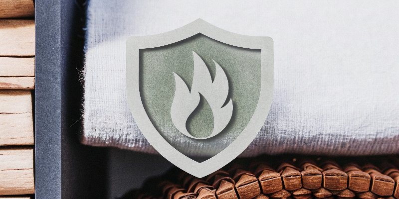 A green shield symbol protecting a product from a flame icon