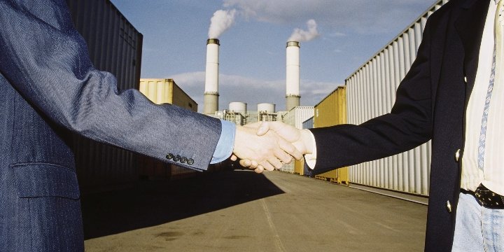 A scientist reviewing a Certificate of Analysis document in a laboratory.