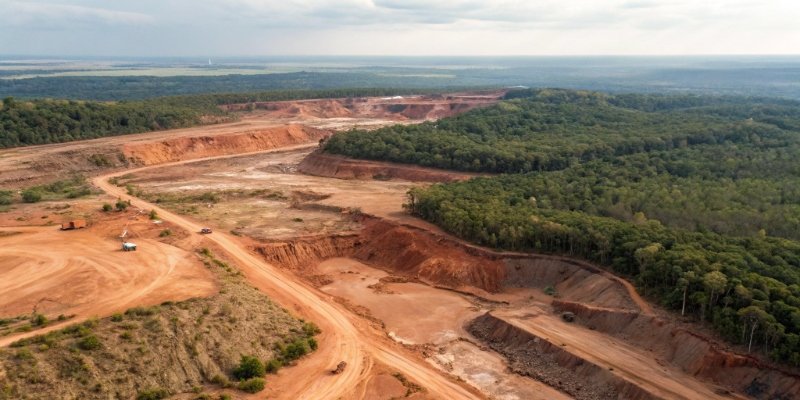 An aerial view of a bauxite mine, showing land impact