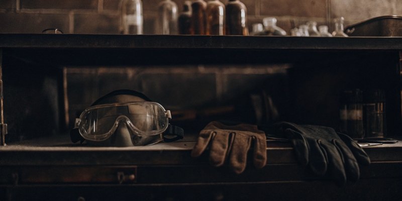A laboratory fume hood with safety equipment inside