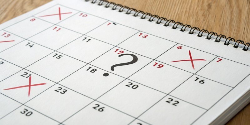 An image of a calendar with many days crossed off, with a question mark over it.